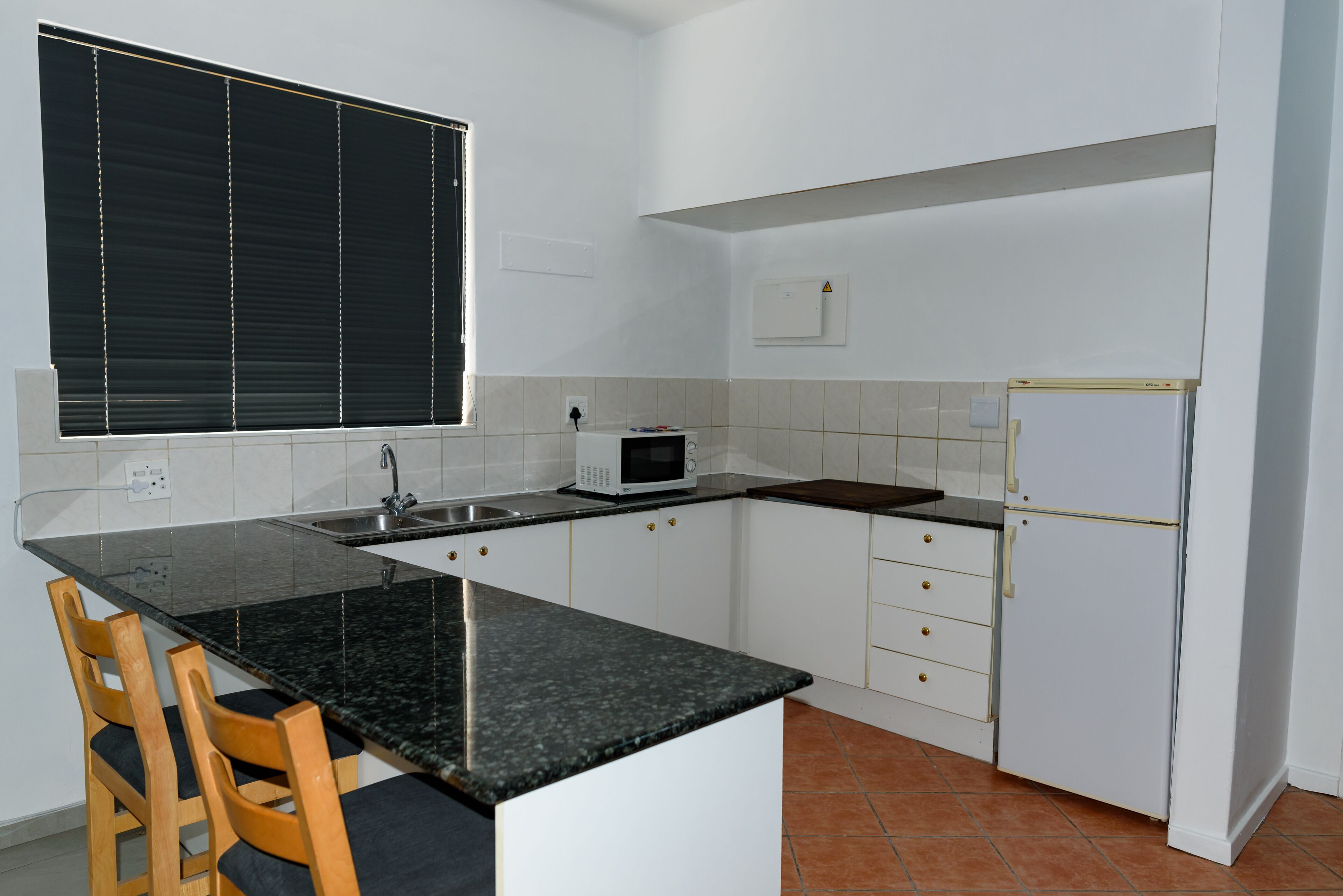 full-sized fridge, microwave, electric kettle