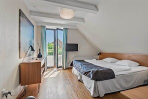 Cortinas blackout, camas plegables/adicionales y wifi gratis