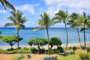 On the beach, sun-loungers, beach towels
