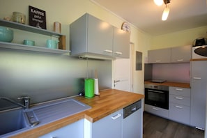 Fridge, microwave, dishwasher, coffee/tea maker