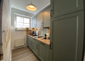 Fridge, microwave, dishwasher, coffee/tea maker