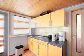 Fridge, coffee/tea maker, electric kettle, toaster