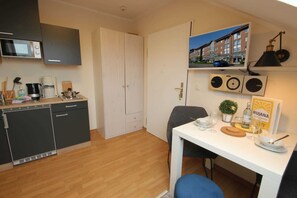 Fridge, microwave, coffee/tea maker, electric kettle