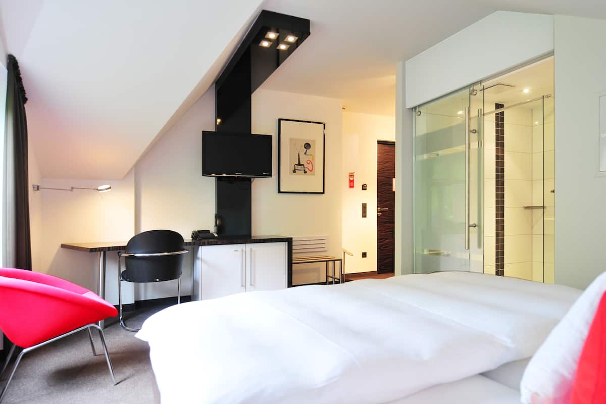 Habitación individual Confort, para no fumadores, vista a la ciudad | Ropa de cama de alta calidad y minibar