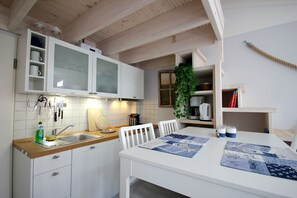 Fridge, dishwasher, coffee/tea maker, electric kettle