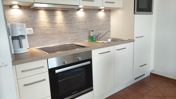 Imagen sin descripción, 1 de 16, botón