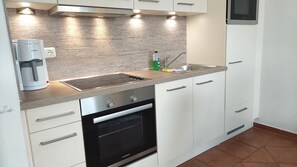 Fridge, microwave, dishwasher, coffee/tea maker