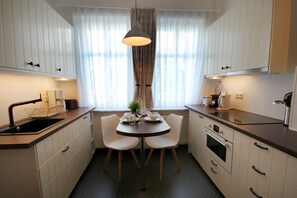 Imagen sin descripción, 5 de 8, botón