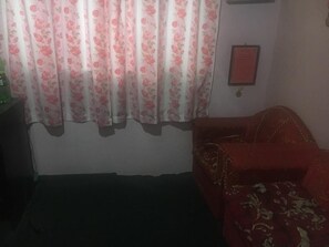 Habitación clásica | Área de sala de estar