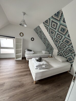4 habitaciones, acceso a internet y ropa de cama 