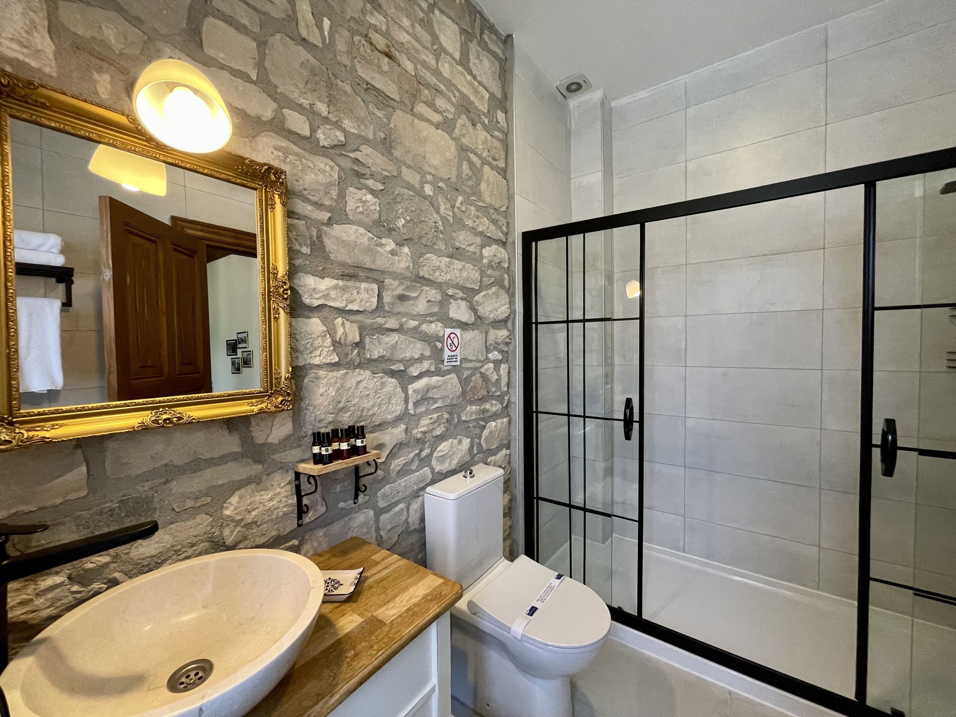 superior room | bathroom | shower, eco-friendly toiletries, hair dryer, slippers