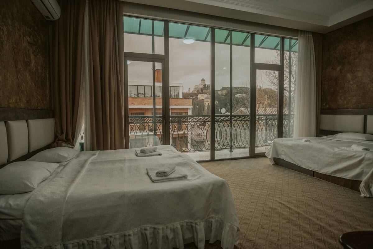 Basic Quadruple Room | Free WiFi, bed sheets