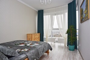 2 habitaciones, tabla de planchar con plancha, wifi y ropa de cama