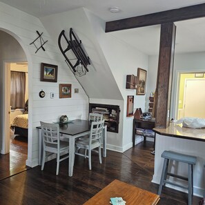 indoor dining, indoor, bed, private space, desk, dining table