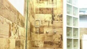 Combined shower/tub, hair dryer, towels, soap