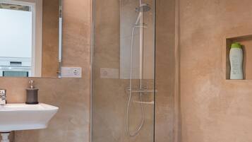 Hair dryer, towels, soap, shampoo