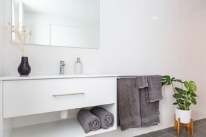 Shower, towels, soap, shampoo