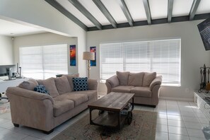 TV, fireplace, books, offices