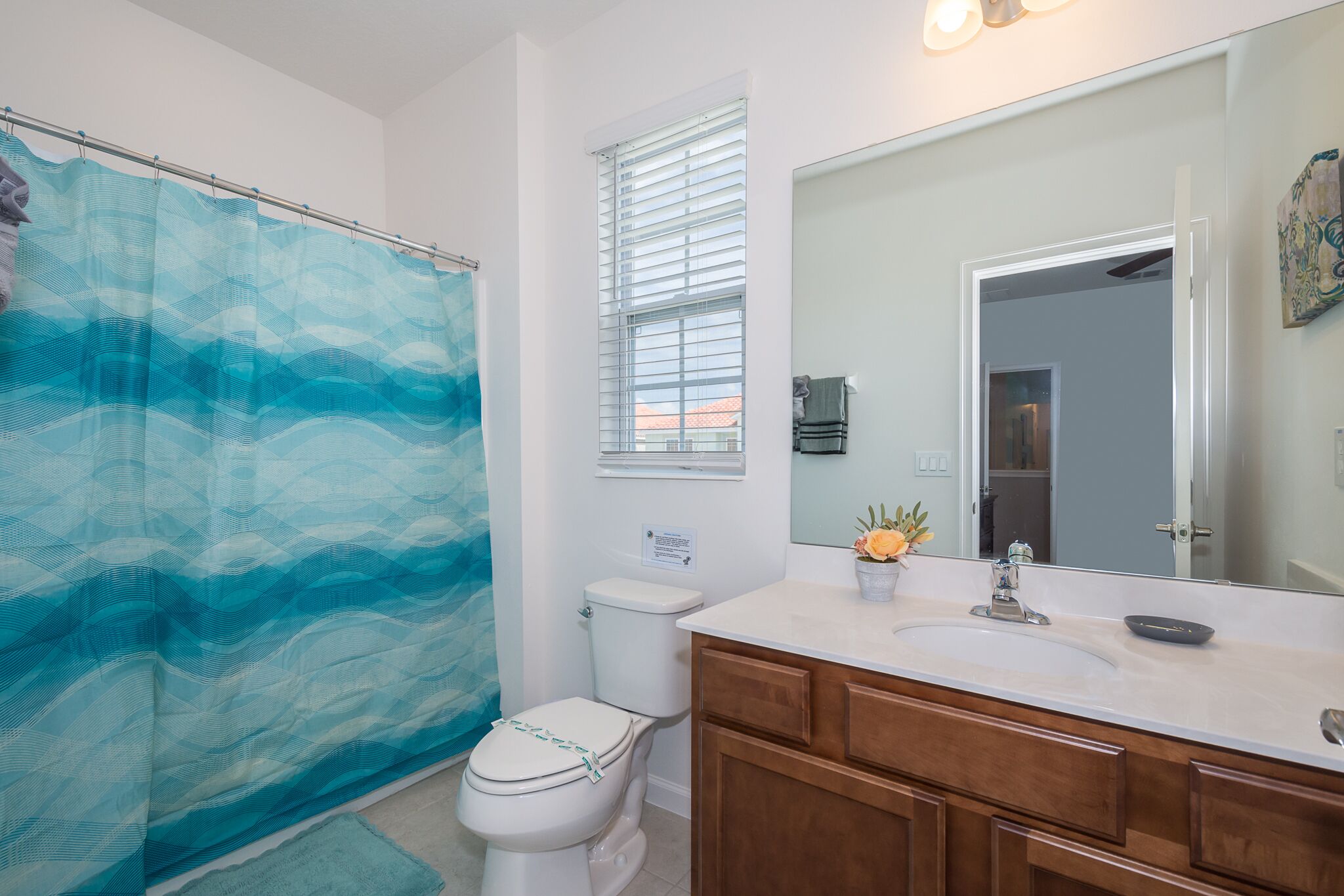 combined shower/bathtub, hair dryer, towels, soap