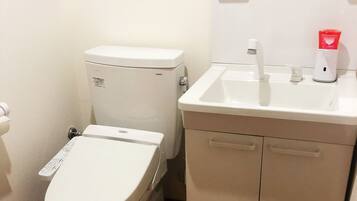 Apartment (201) | Bathroom | Separate tub and shower, free toiletries, hair dryer, slippers
