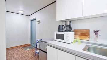 Fridge, microwave, cookware/dishes/utensils, spices