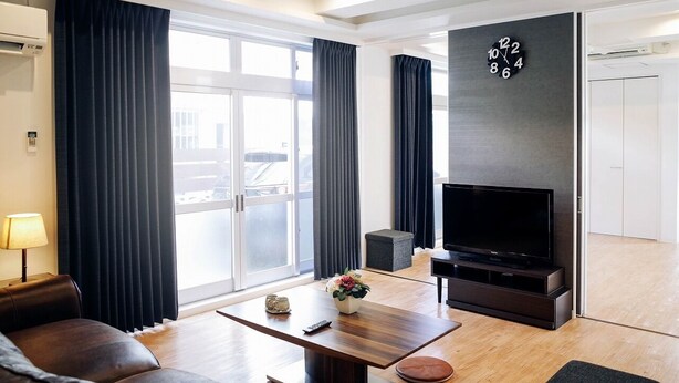 Private Vacation Home | Living area | Flat-screen TV - Pension Seiran (Ginowan)