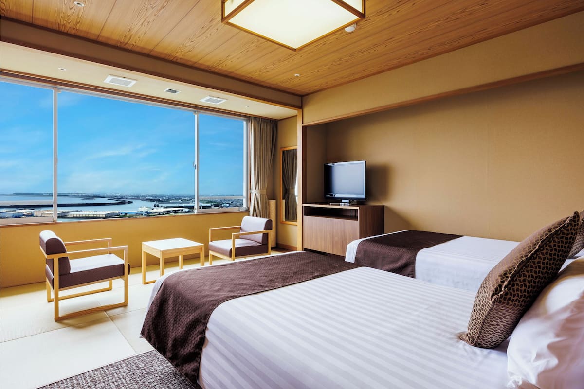 Traditionele Twin kamer, niet-roken, uitzicht op oceaan (Japanese-style, With shower booth) | Een kluis op de kamer, verduisterende gordijnen, gratis wifi