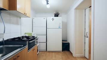 Fridge, microwave, cookware/dishes/utensils, spices
