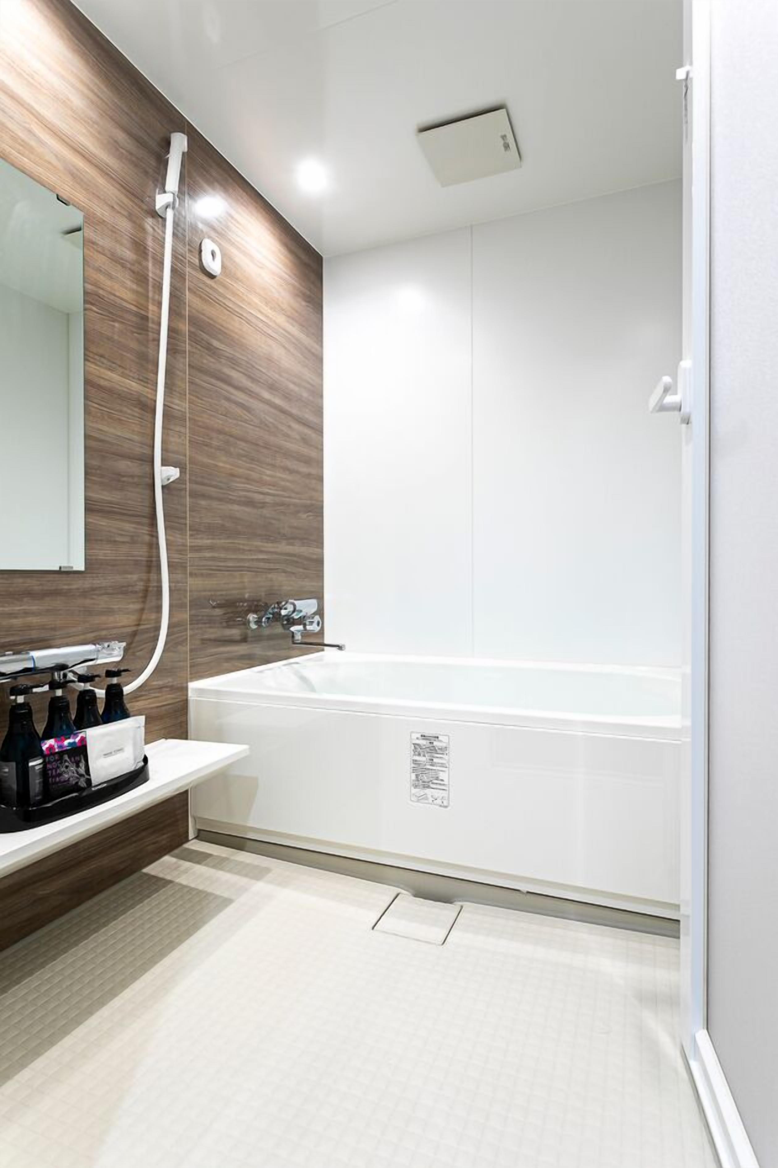 combined shower/bathtub, free toiletries, hair dryer, bathrobes