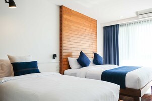 Family Triple Room | Premium bedding, minibar, in-room safe, desk