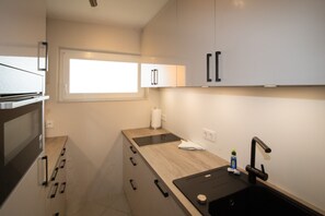 Refrigerador, microondas, horno y lavavajillas 