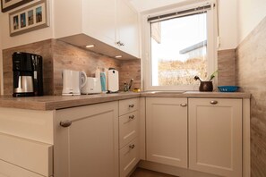 Kühlschrank, Geschirrspüler