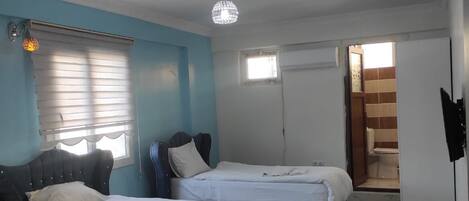 Classic Triple Room, Multiple Beds, Non Smoking | Iron/ironing board, free WiFi, bed sheets