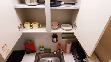 Fridge, microwave, cookware/dishes/utensils