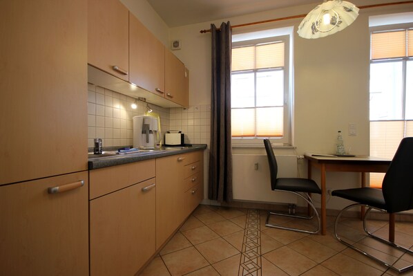 Fridge, coffee/tea maker, electric kettle, toaster