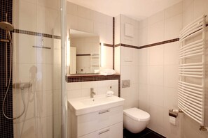 Regadera y secadora de cabello 