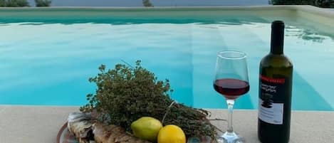 Outdoor pool, pool umbrellas, sun loungers
