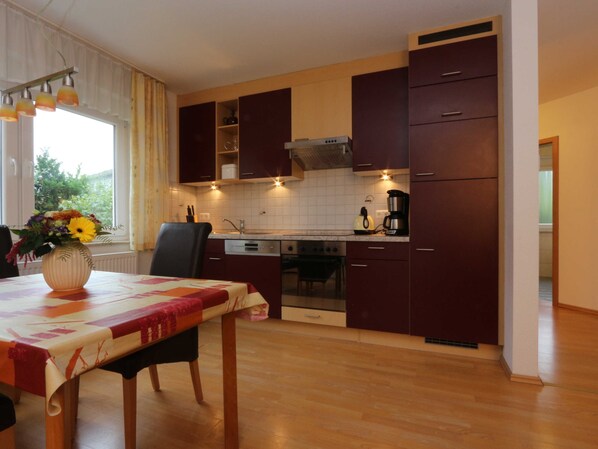 Fridge, oven, dishwasher, high chair