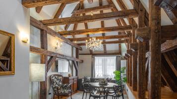 Two Bedroom Apartment Attic | Living area | 30-inch Smart TV with satellite channels, TV, Netflix