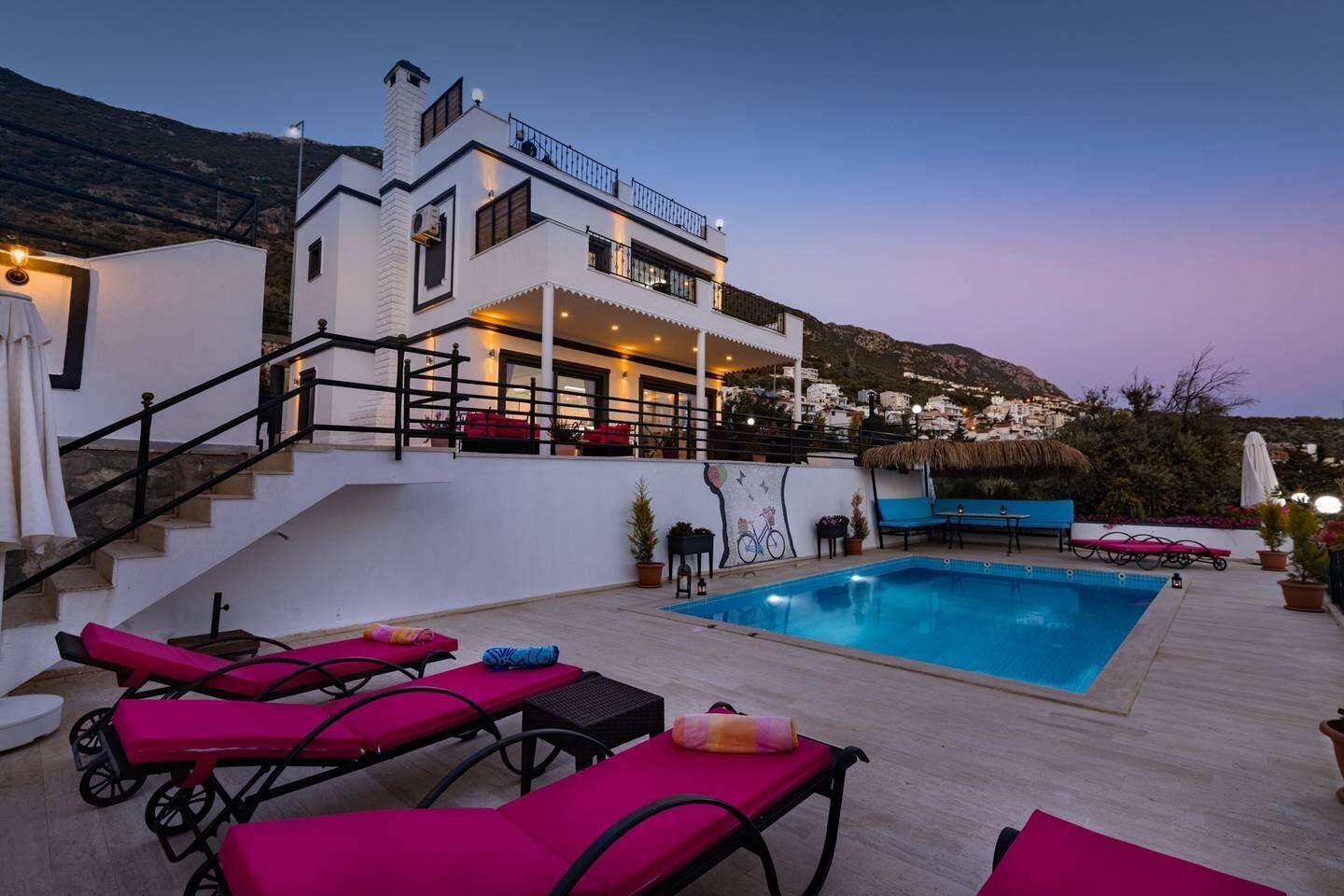 Outdoor pool, a heated pool, pool loungers