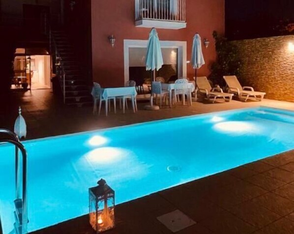 Seasonal outdoor pool, open 9:00 AM to 8:00 PM, sun loungers