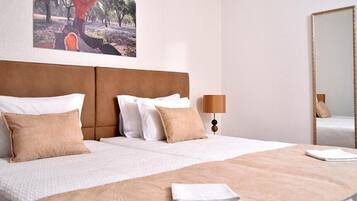 Premium bedding, individually furnished, blackout curtains