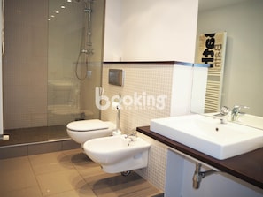 Shower, bidet, towels, soap