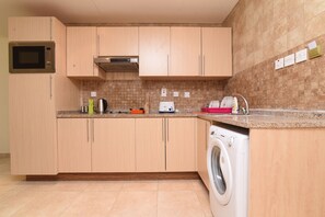 Private kitchen - OYO Home 2351BHK Capitol Tower DIC (Dubai)
