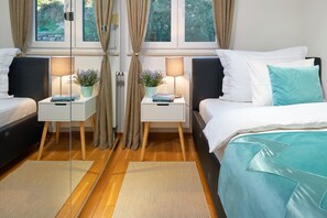 Departamento, 3 habitaciones | Tabla de planchar con plancha, wifi gratis y ropa de cama 