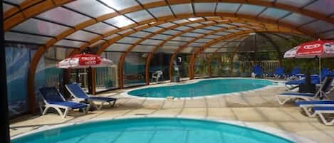Indoor pool, seasonal outdoor pool, pool umbrellas, sun loungers