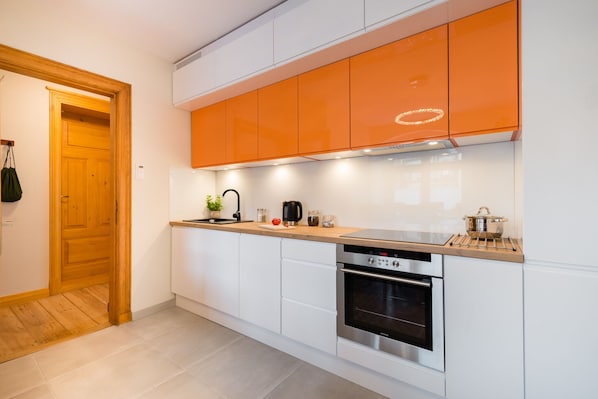 アパートメント 1 ベッドルーム | 専用キッチン | 大型冷蔵庫、オーブン、コンロ、食器洗い機