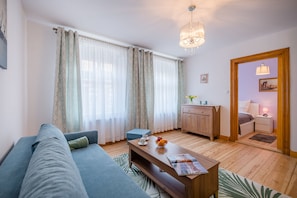 アパートメント 1 ベッドルーム | 1 室のベッドルーム、羽毛の掛け布団、防音設備、アイロン / アイロン台