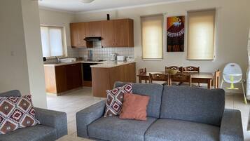 Premium Villa, Private Pool (Joanna) | Living area | 42-inch flat-screen TV with satellite channels, TV