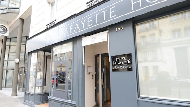 The exterior of the Hotel Lafayette, featuring a modern facade with large windows and a prominent entrance. - Lafayette Hotel (Paris)